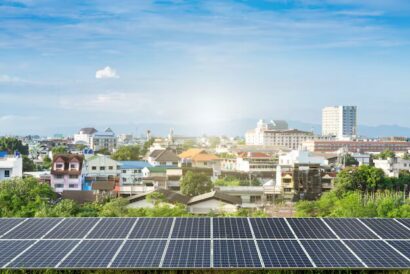 solar-panel-with-modern-city-construction_29332-2116